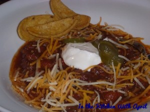 Chili with Fritos, Cheese, Sour Cream and Jalapenos