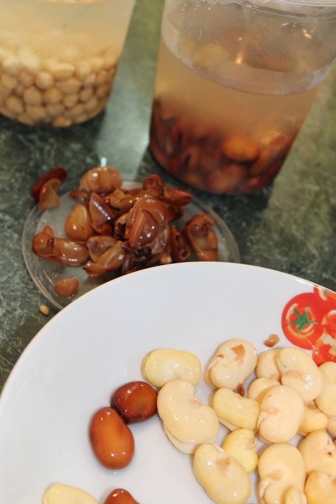 Peeling fava beans and chickpeas